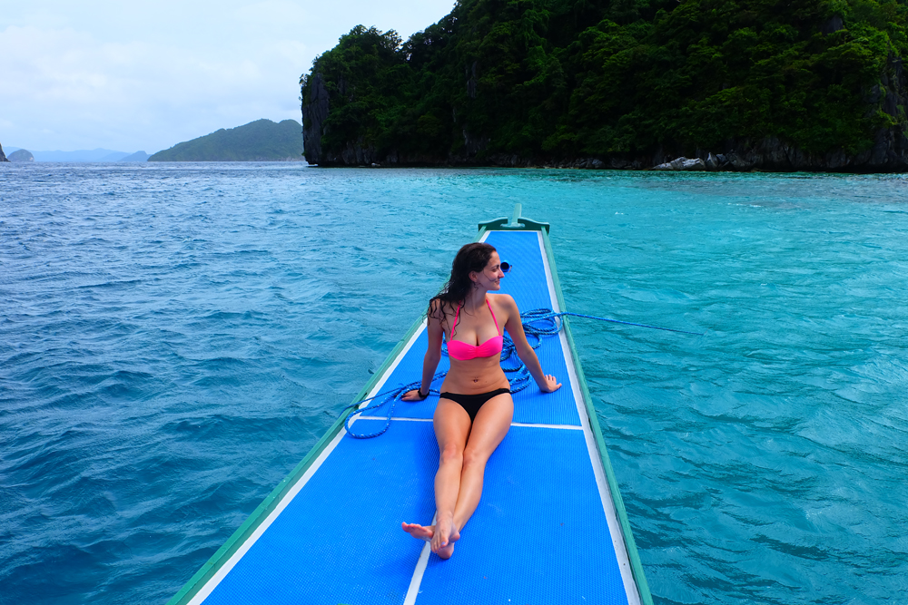 Girl on boat in El Nido, Philippines