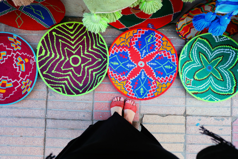 Looking down at colourful baskets on the ground on a Morocco vacation 