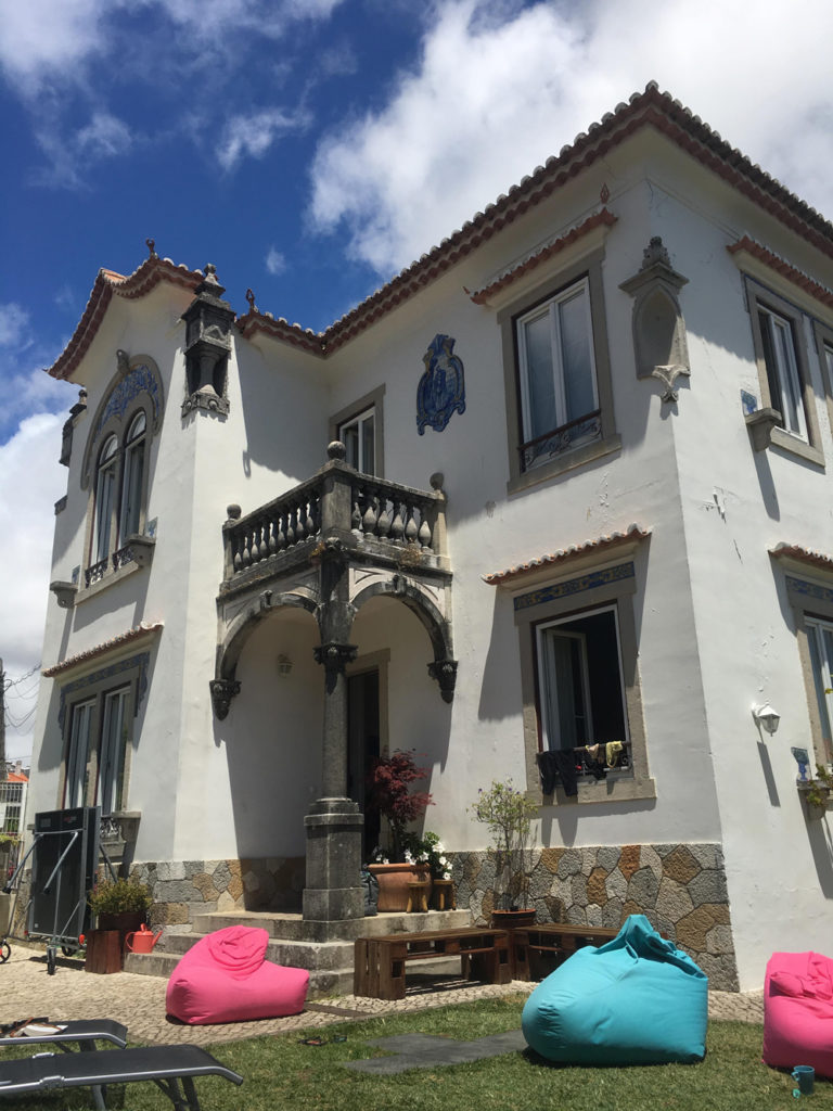 Salty Pelican Surf & Yoga Hostel was an absolute amazing vacation experience while in Portugal. Pictured here is the exterior.