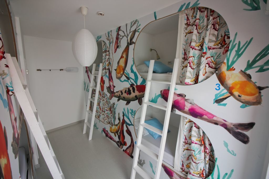 Where is the best place to stay in Portugal? Camone Hostel in Lagos had the most adorable themed rooms like this aquarium room pictured here.