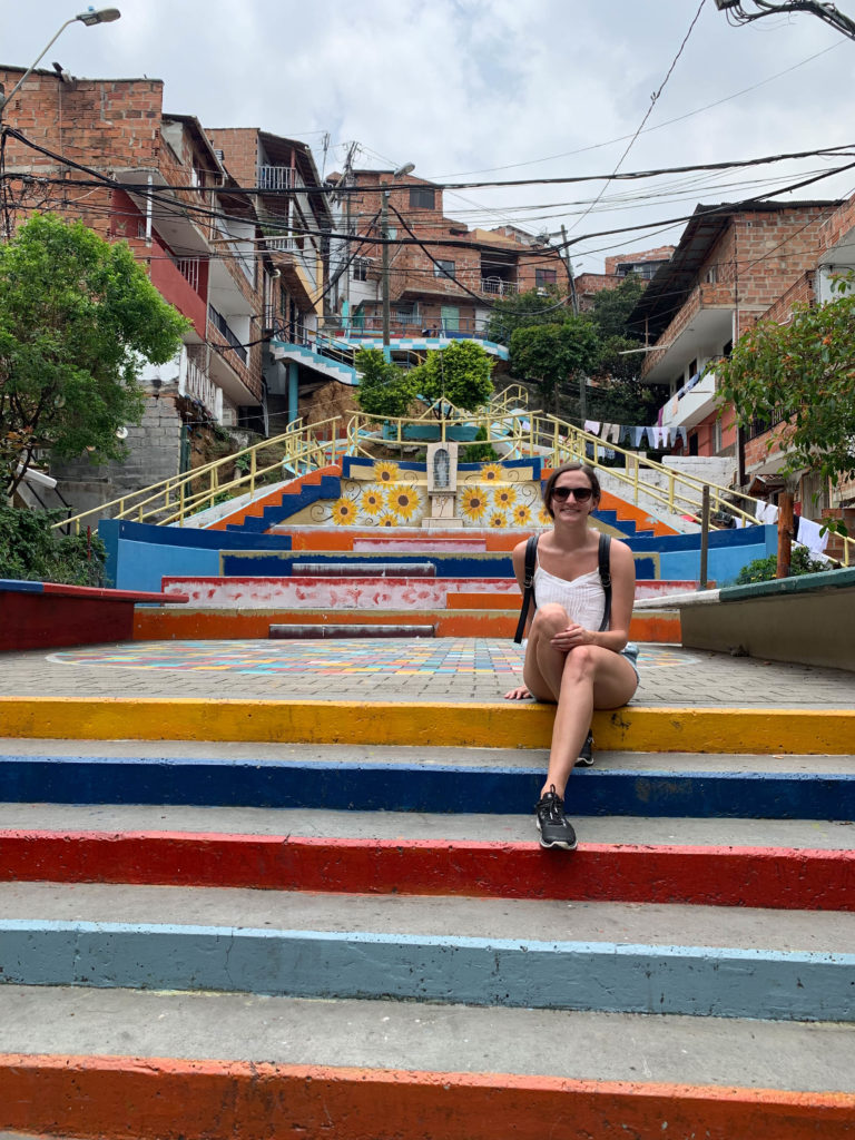 Lauren in Comuna 13, a neighbourhood that is a must-visit in Medellin, Colombia.