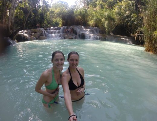 To girls in Kuang Si waterfalls in Laos