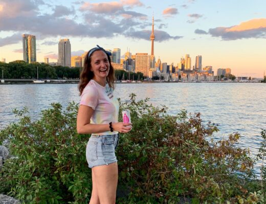 Girl in front of Toronto skyline at Trillium Park in Ontario Place
